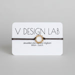 Brown bracelet with Spira Molla circular design on a 'V Design Lab' 