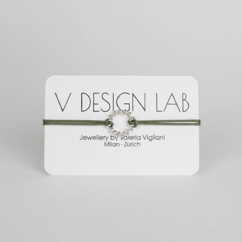 Sage Green bracelet with Spira Molla circular design on a 'V Design Lab' 
