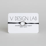 Black bracelet with Spira Molla circular design on a 'V Design Lab' 
