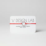 Coral Red bracelet with Spira Molla circular design on a 'V Design Lab' Rhodium plated Recycled Silver 925
