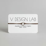 Bracelet with heart-shaped on a V Design Lab card 